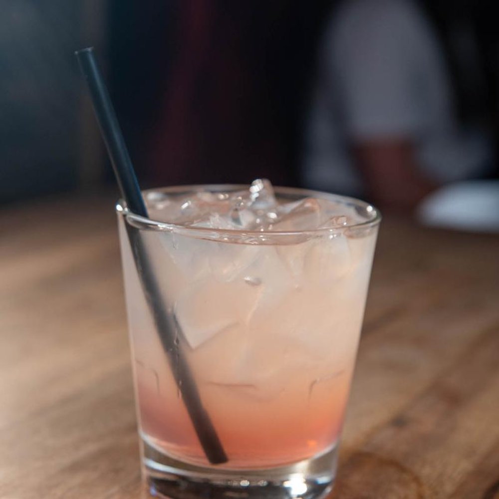 Berry Vodka Sour Cocktail On A Table.