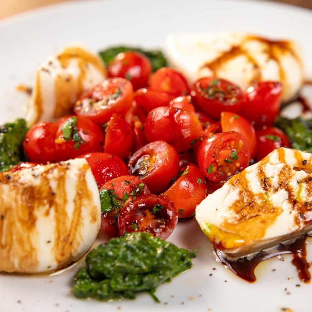 Caprese Salad With Burrata Tomatoes Basil And Balsamic.