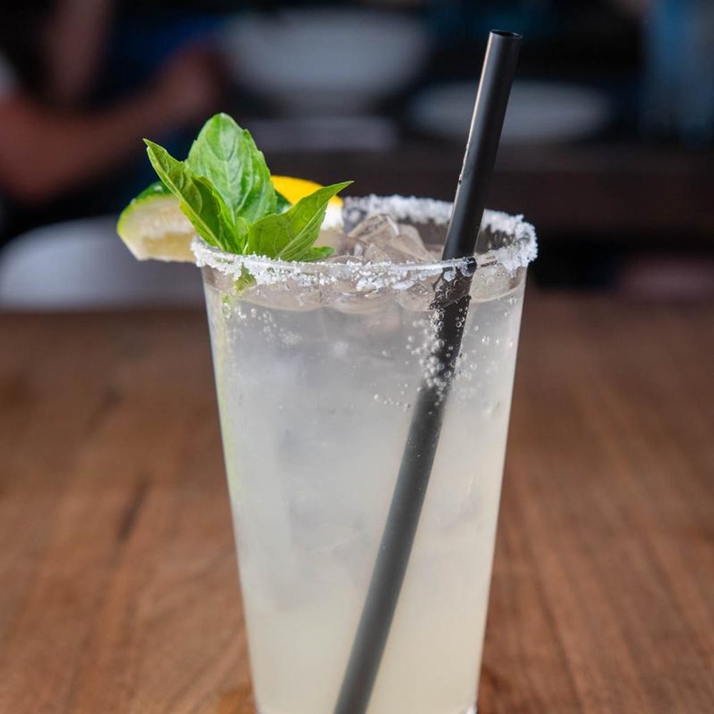 Club Special Cocktail With A Salted Rim Lime Lemon And Mint.