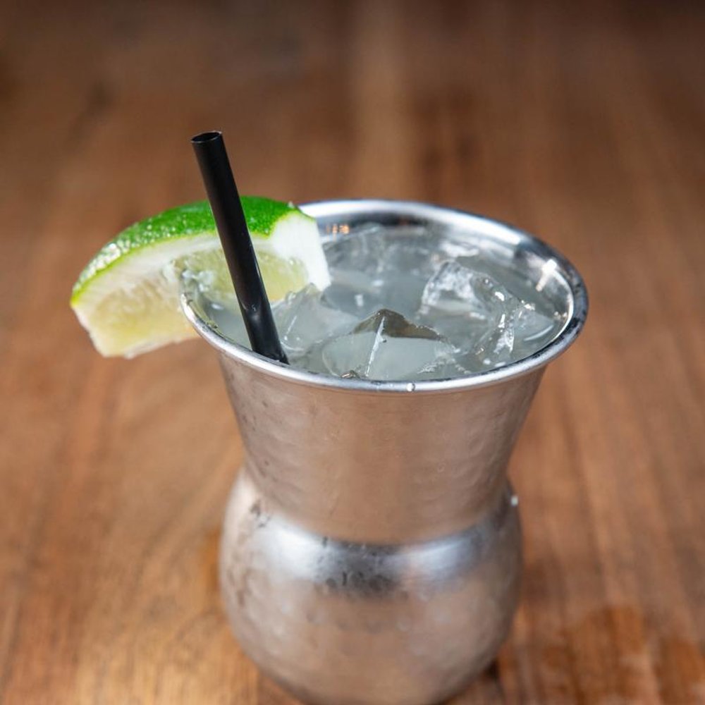 Moscow Mule Cocktail In A Metal Cup With Lime Garnish.