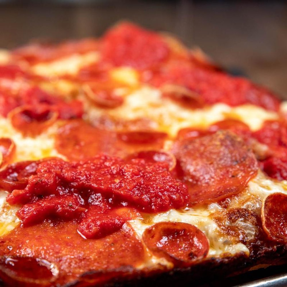 Pepperoni Pizza With Wisconsin Brick Cheese Close Up.