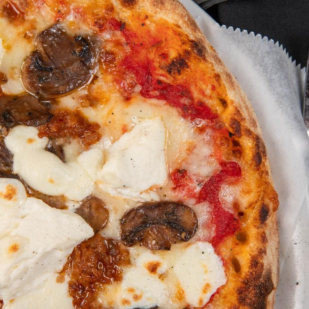 Red Pizza With Cheese And Mushrooms Close Up.