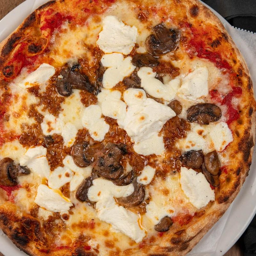 Red Pizza With Mozzarella Pecorino Sausage And Mushrooms.