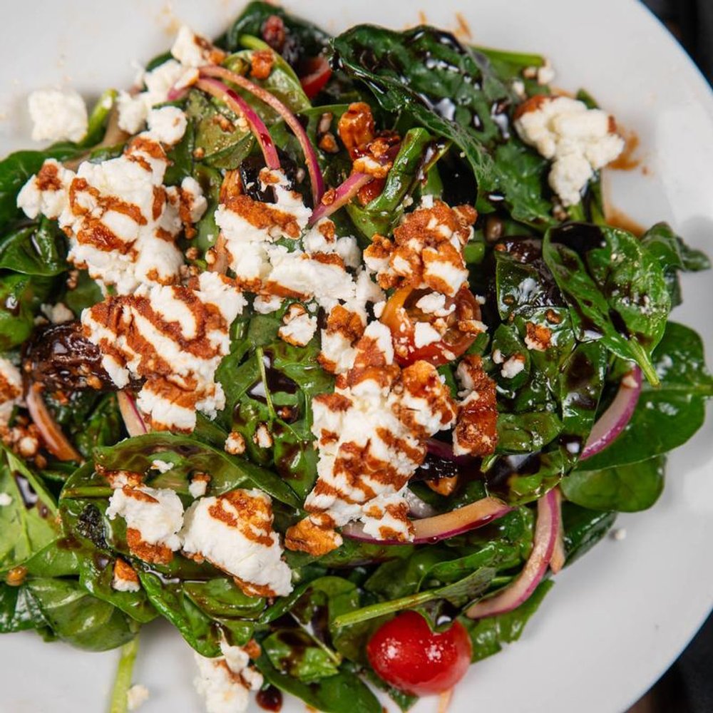 Spinach Salad With Cheese Tomatoes Dates Pecans And Balsamic.