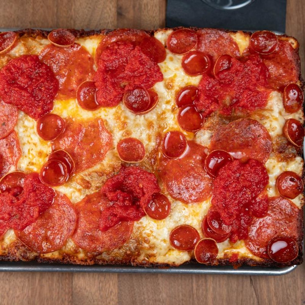 Top View Of A Square Pepperoni Pizza.